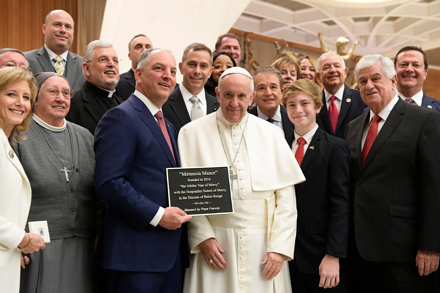 Pope Francis poses for a photo with Louisiana Gov. John Bel Edwards and his delegation during the Pope’s general audience at the Vatican Jan. 18, 2017. Edwards, a Catholic, said he will sign into law a measure that makes nearly all abortions illegal in the state once the fetal heartbeat is detected, which could be as early as six weeks.